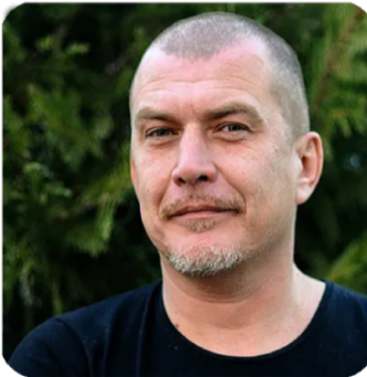 male customer age 45 smiling after improved sleep and fewer nighttime bathroom trips